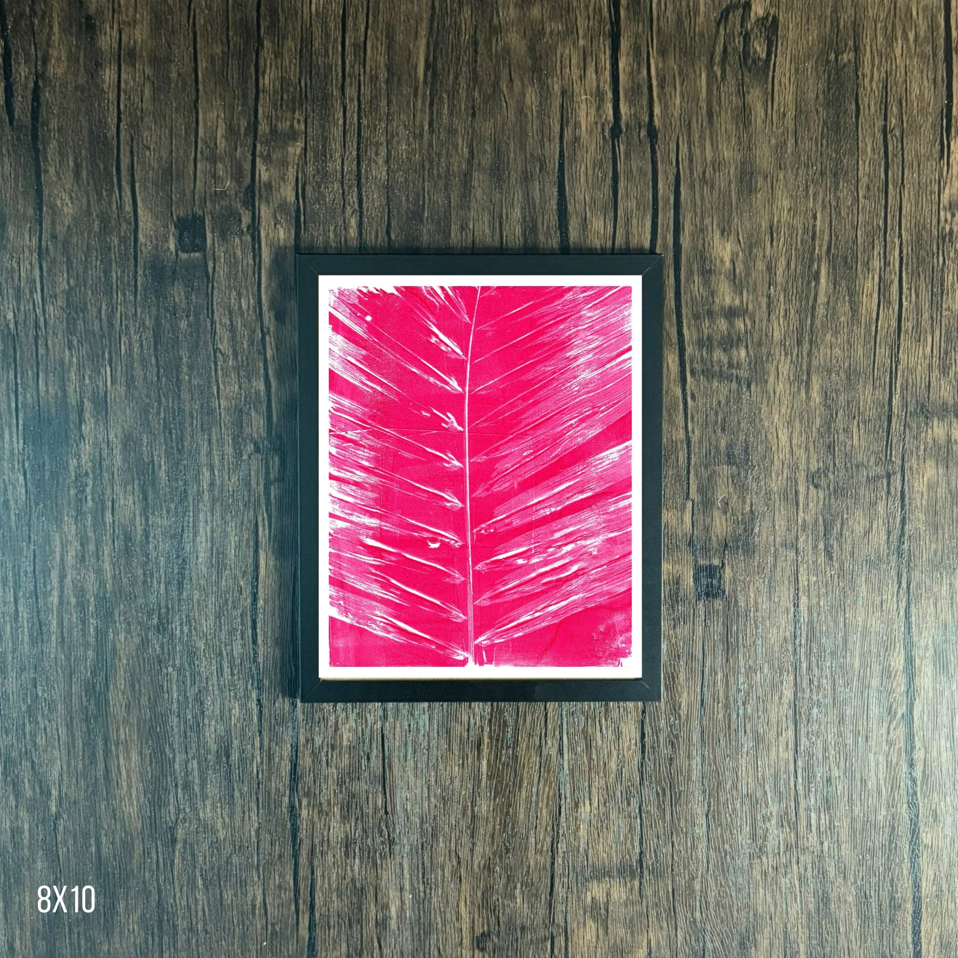 Framed Magenta leaf print on wooden background, 8x10