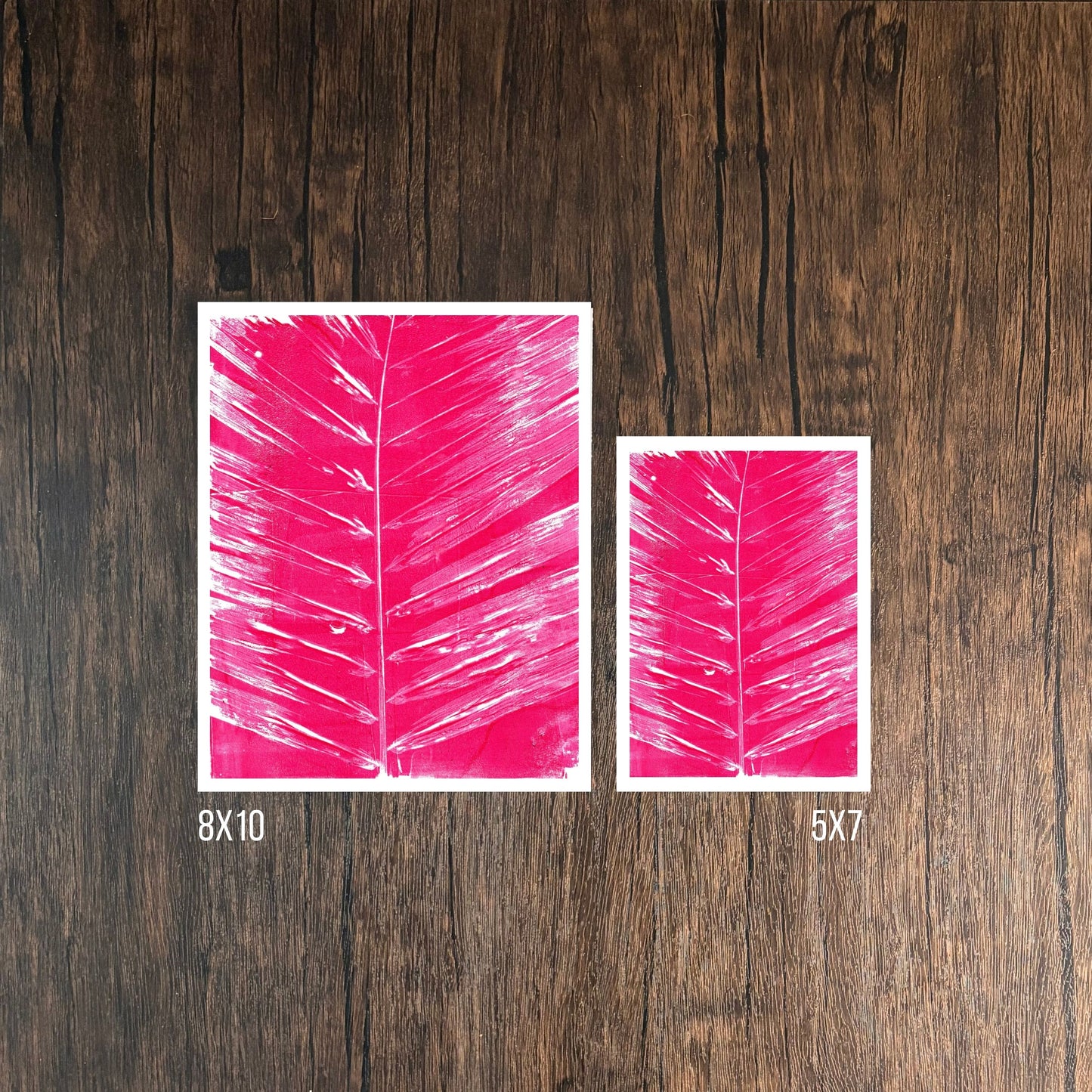 Magenta leaf print on wooden background, 8x10 and 5x7